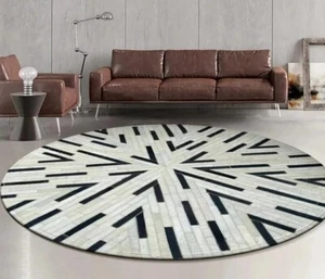 Handmade Leather Rug Art – Round Monochrome Design for Minimalist Spaces - Picture 1 of 4