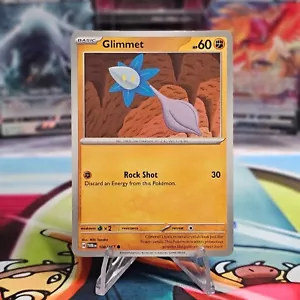 Glimmet - 108/167 - Mascarada Crepúsculo - Juego de cartas coleccionables Pokémon - No Holo - Casi nuevo - Imagen 1 de 2