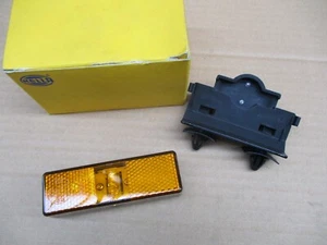 NEU Original Hella 2PS008643021 LED GELBE SEITENMARKIERUNGSLEUCHTE 24 V CLIP-HALTERUNG - Bild 1 von 2
