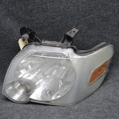 Faro delantero conductor Ford Explorer LH 2006-2010 7L2J-13006-A OEM 70062 Foto 1 de 4