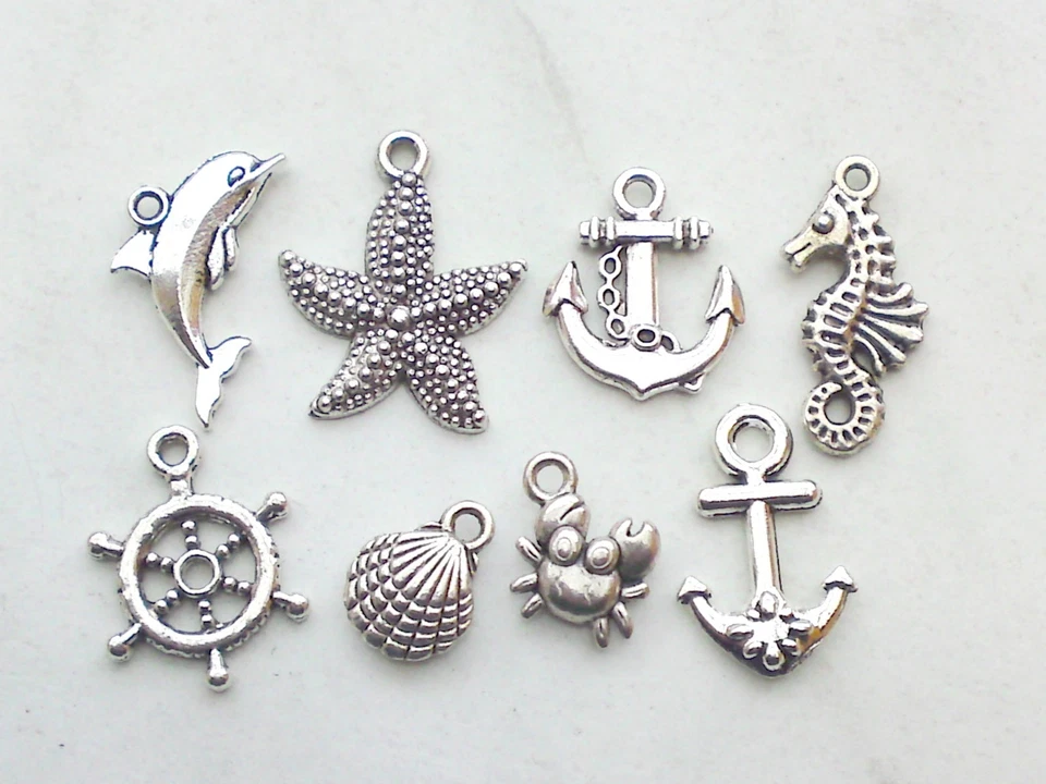 8x Anhänger-Set Maritim Charms Anker Seestern Delfin Muschel Schmuck Basteln Neu - Bild 1 von 1