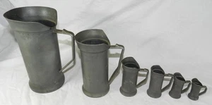 Lote de 6 jarras medidoras de peltre vintage con sellos - Imagen 1 de 11
