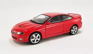 GMP ACME 1:18 2006 PONTIAC GTO TORRID RED WITH BLACK INTERIOR NEW 18988 - Picture 1 of 5