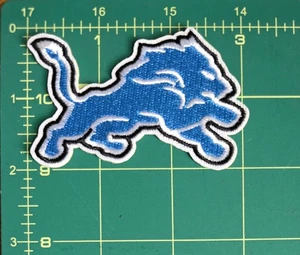 Parche bordado de hierro de 3" de Detroit Lions NFL fútbol americano NUEVO 3 pulgadas x 2 pulgadas - Imagen 1 de 2