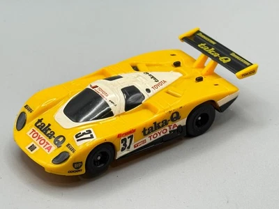 Coche Ranura TOMY AFX TURBO TOYOTA 89C Amarillo/Negro Taka-Q #37 HO - Usado Solo Japón Foto 1 de 4