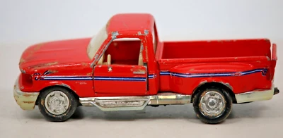 Camioneta pickup Ford F-150 Road Champs escala 1:43 naranja desgastada y camioneta agrícola Foto 1 de 4