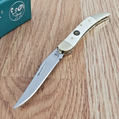 Cuchillo plegable palillo de dientes para gallina y gallo hoja de acero inoxidable mango de hueso blanco Foto 1 de 4