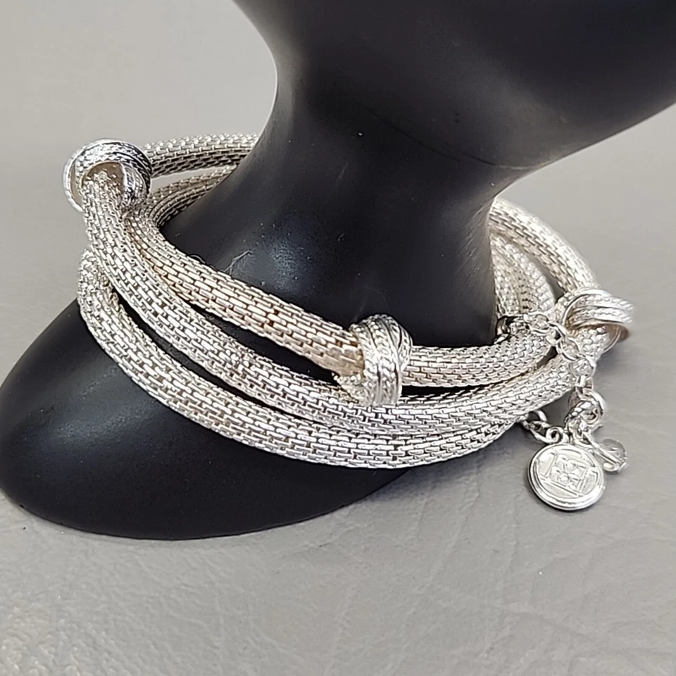 Pulsera de malla Dana Buchman tono plata triple capa cadenas nudos Foto 1 de 4
