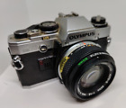 Olympus OM10 Film Camera & Om system 50mm F1.8 Lenns . Selling Spares Or Repair
