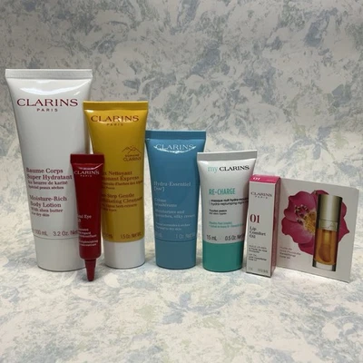 Clarins Loción Corporal Rica en Hidratación, Limpiador, Mascarilla, Ojos, Aceite Labial 6 Piezas - Nuevo Foto 1 de 4