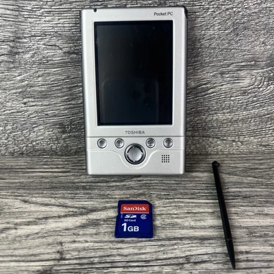 Toshiba Pocket PC e310 con memoria y lápiz, sin probar para reparación o repuestos Foto 1 de 4