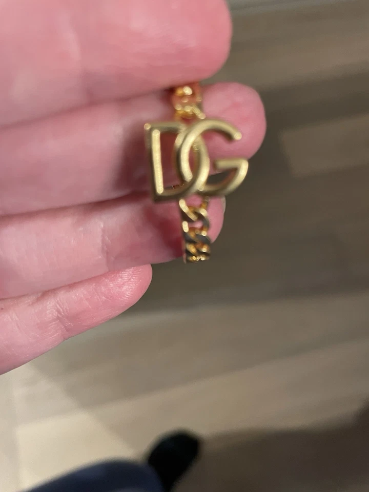 Pendientes de aro mini Dolce & Gabbana. Acabado latón de Italia Foto 1 de 1