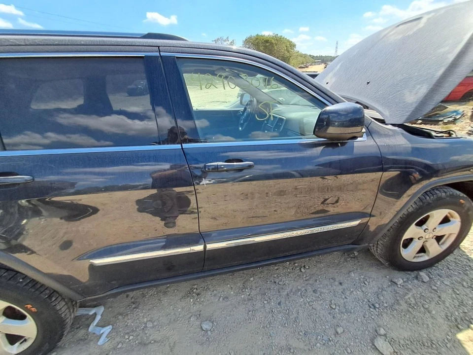 Jeep Grand Cherokee 2013 pasajero puerta delantera SUV de 4 puertas azul usado camioneta local Foto 1 de 4