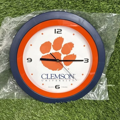 "Reloj Clemson Tigers redondo estilo pared tamaño 11,5"" X 11,5"" hora del sol" Foto 1 de 4