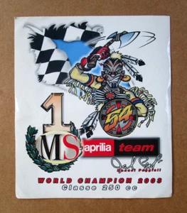 ADESIVO "MS APRILIA TEAM - MANUEL POGGIALI WORLD CHAMPION 2003 - CLASSE 250 CC" - Picture 1 of 1