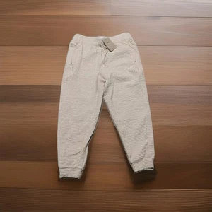 Nike Yoga Dri-Fit Tapered hellbraun beige Hose DV9885-126, Herren Größe Medium - Bild 1 von 8