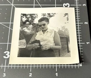 1950s Woman w/ CAMERA Changing FILM Female PHOTOGRAPHER Antique Snapshot PHOTO - Picture 1 of 3