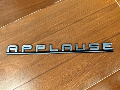 Daihatsu applause Rear Emblem Badge OEM 1995 - Image 1 of 4