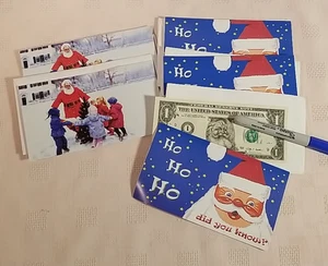 Menge 5 US Ein-Dollar Scheine mit Weihnachtsmann Gesicht Aufkleber Sammlerstücke - Bild 1 von 1