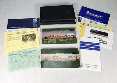 Jeep Grand Cherokee 2004 juego manual del propietario con estuche OEM Foto 1 de 4