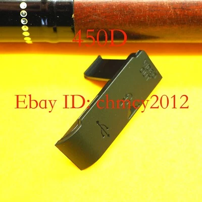 Nueva cubierta de goma USB/AV OUT/HDMI/MIC para Canon EOS 450D/Rebel XSi/Kiss X2 Foto 1 de 2