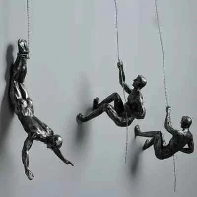 Resin Climbing Man Set of 9 Art Wall Sculptures Industrial Style Hanging Decor - Image 1 of 4