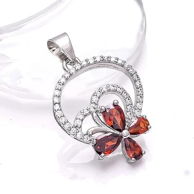 Colgante con dije de granate simulado corte pera de 2 quilates enchapado en oro blanco de 14 quilates Foto 1 de 4