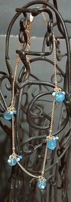 Pulsera AVON tono plata y cuentas azules Foto 1 de 3