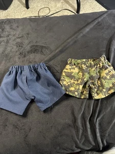 2 pares de pantalones cortos Build A Bear azules y camuflados - Imagen 1 de 7