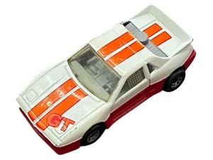 MATCHBOX 1985 PONTIAC FIERO GT WHITE ORANGE STRIPE WIDE BODY 1:56 SCALE - Picture 1 of 8