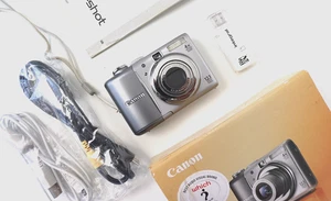Canon PowerShot A1100 IS fotocamera digitale argento 12,1 MP - SCATOLA + accessori - Foto 1 di 14