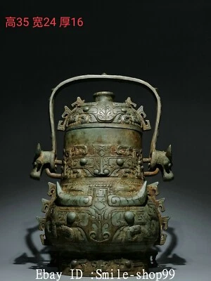 Hervidor de agua con mango de cabeza de ganado cara de bestia de mercancía de bronce de la dinastía Shang Zhou de 13,7" Foto 1 de 4