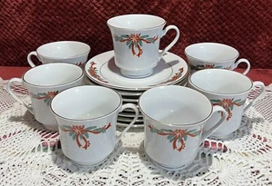 Tienshan “Poinsettia & Ribbons” Cup & Saucer Sets, 7-Cups, 8-Saucers Christmas - Picture 1 of 11
