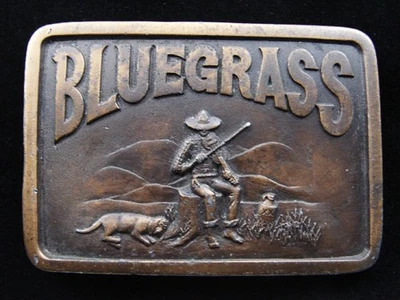 RE07143 HEBILLA DE CINTURÓN VINTAGE AÑOS 70 **BLUEGRASS** MÚSICA CONMEMORATIVA BRONCE Foto 1 de 2