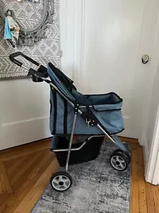 Gently used blue dog stroller: The same one as Millie Bobbie Brown - Picture 1 of 5