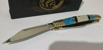 TURQ AZUL. NAVAJA DE BOLSILLO DE CAZA MADREPERLA CON VITRINA PLATEADA H. 3 BL. Foto 1 de 4