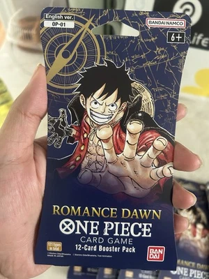 One Piece ROMANCE DAWN - TCG Paquete de refuerzo con mangas inglesas sellado 12 tarjetas OP-01 Foto 1 de 4