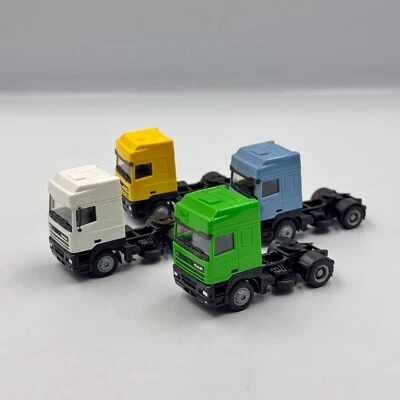 Truck set DAF 95 (4 pcs) yellow, white, blue, green scale 1/87 (H0) - Image 1 of 4