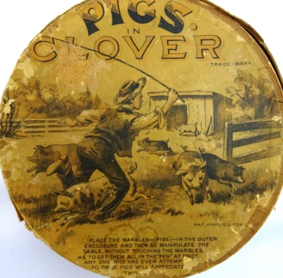 ANTIGUO JUGUETE CERDOS EN TRÉBOL CIRCULARES CARTÓN CANICAS JUEGO MOVIMIENTO DESTREZA Foto 1 de 4