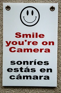 SMILE YOU'RE ON CAMERA SIGN 8"x12" w/ Grommets Security Surveillance Spanish - Picture 1 of 1