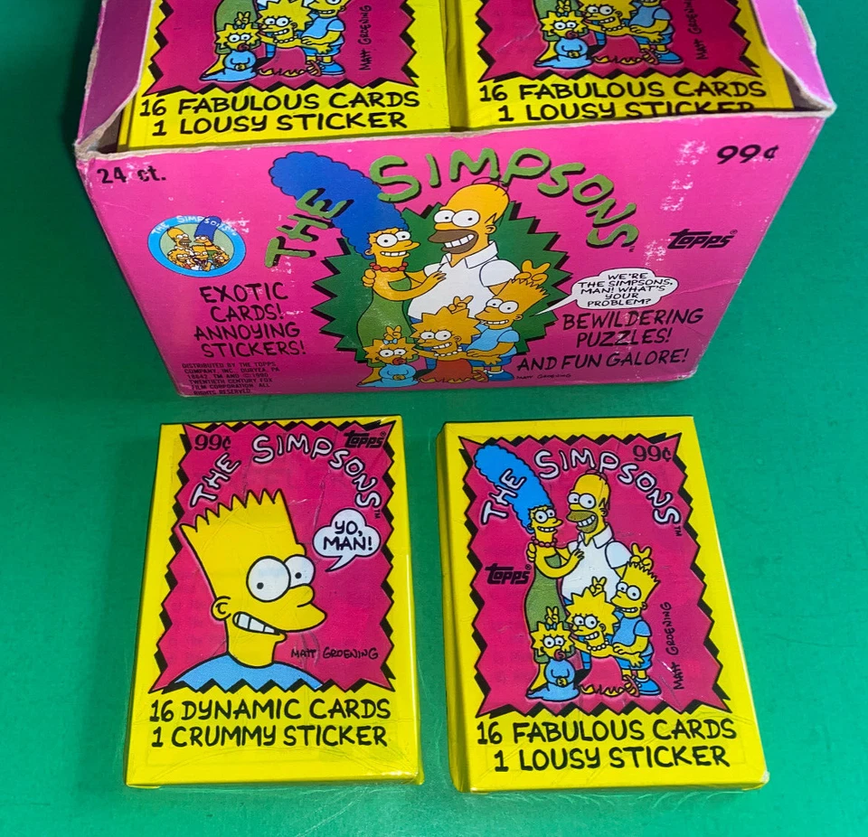 TWO DIFFERENT TOPPS THE SIMPSONS UNOPENED JUMBO PACKS OF 16 CARDS + 1 STICKER - Image 1 of 1