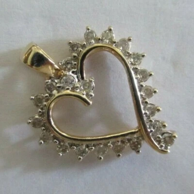 Colgante corazón diamante oro 10K diamante = 2/3 quilates F-SI2 2,70 gramos Foto 1 de 4