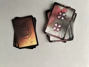 EXCLU REAL SURVIVAL+SUSP ENG CARDS/RESIDENT EVIL THE BOARD GAME STEAMFORGED G379 - Imagen 1 de 2