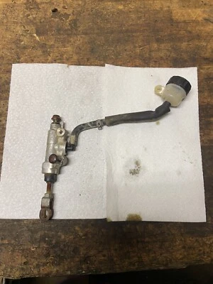 1989 SUZUKI RM250 RM 250 REAR BRAKE MASTER CYLINDER WITH RESERVOIR - Image 1 of 4