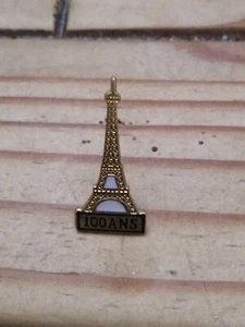 Pin's Pins Pin LAPEL France MONUMENT PARIS  100 ANS "TOUR EIFFEL"  - Picture 1 of 2