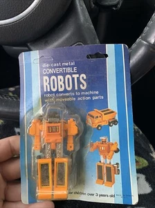 VTG Die-Cast Metal Convertible ROBOTS 80s Robot To Construction Truck Still Seal - Picture 1 of 4