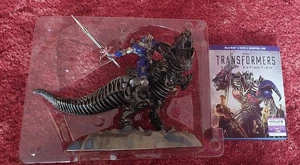 Transformers Optimus Prime mit Dinobot, T-Rex Dinosaurier, Figur+ Bluray & DVD - Bild 1 von 8