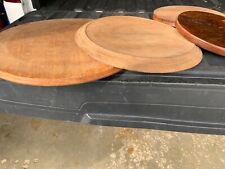 Four old round table top lumber