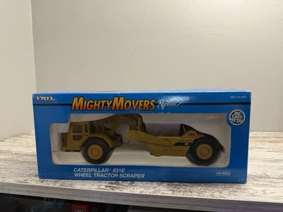 Rascador tractor de ruedas Caterpillar Cat 631E - ERTL escala 1:50 modelo fundido a presión #2430 Foto 1 de 4