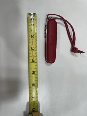 Navaja suiza Victorinox Coach Climber con mango de cuero rojo. Foto 1 de 4